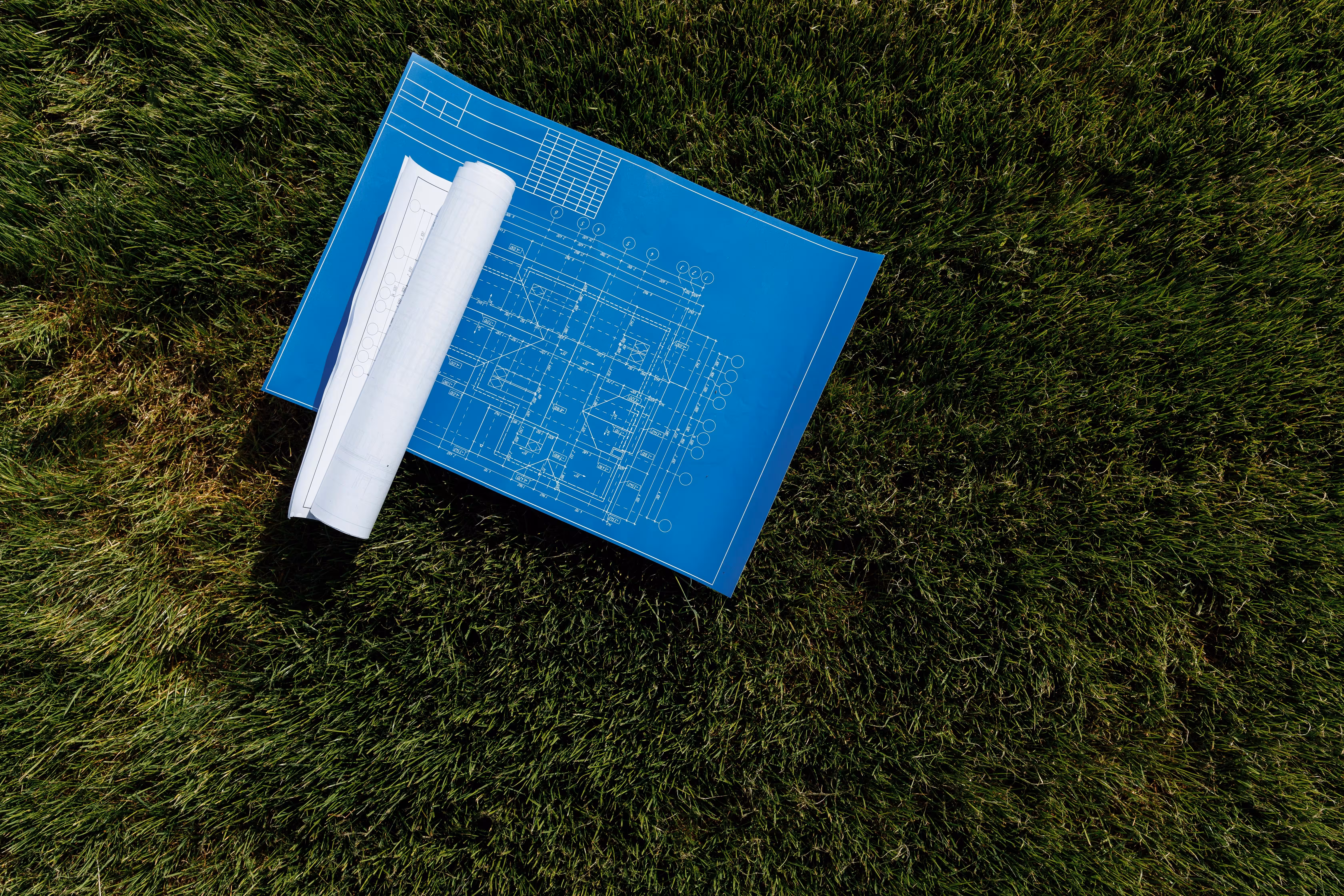 Legal ownership documents and title verification for land transactions